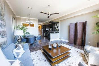 Open concept living and dining area with modern furnishings